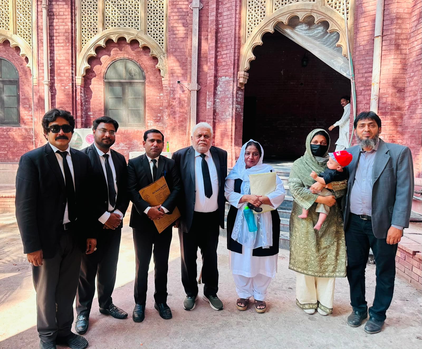 Counsel outside the court building